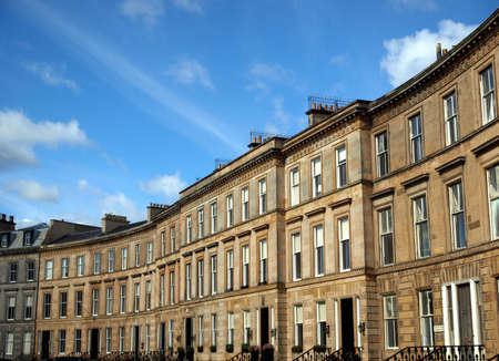 A row of terraced houses in Glasgow West End, Scotlandの写真素材