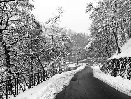 City of Turin (Torino) skyline panorama seen from the hill - winter view with snow