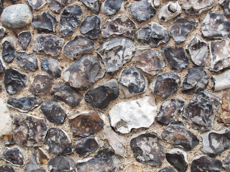 Old wall made of flint stones from Kent UKの写真素材