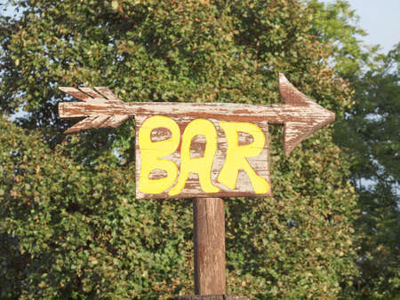 Bar sign with an arrow pointing directionの写真素材
