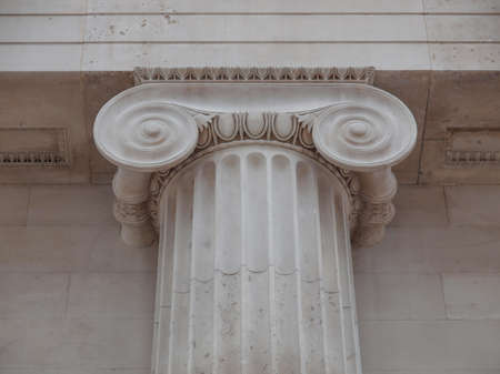 Architectural detail of an ancient decorated capitalの写真素材