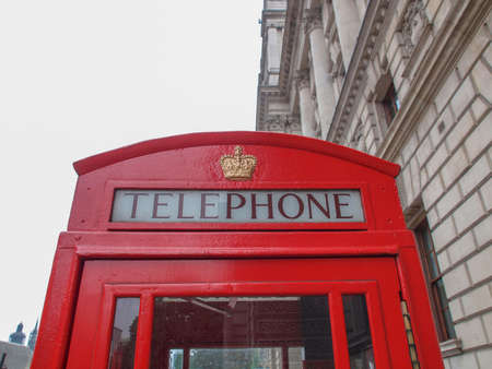 Traditional red telephone box in London UKの写真素材