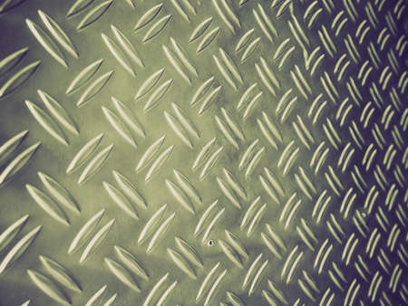 Vintage retro looking grunge steel plate useful as background