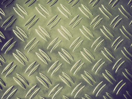 Vintage retro looking grunge steel plate useful as background