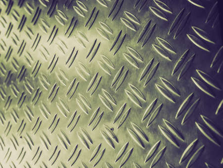Vintage retro looking grunge steel plate useful as backgroundの写真素材