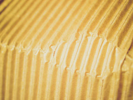 Vintage looking brown corrugated cardboard sheet backgroundの写真素材