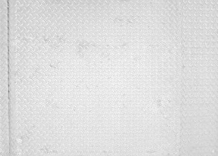 Black and white vintage looking steel plate useful as backgroundの写真素材