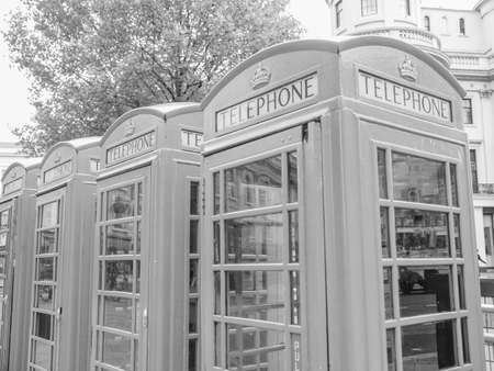 Traditional red telephone box in London UK in black and whiteの写真素材