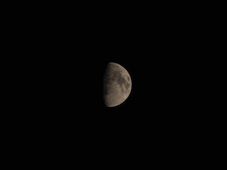 Moon at night over the black skyの写真素材