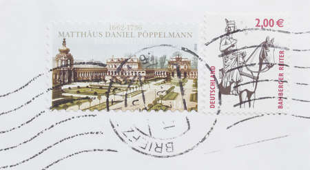 BERLIN, GERMANY - DECEMBER 27, 2013: German stamps with Matthaeus Daniel Poepperman and Bamberger...