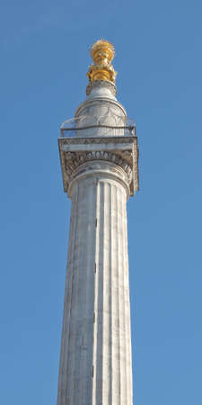 The Monument to commemorate the Great Fire of London in 1666 - over blue sky 
