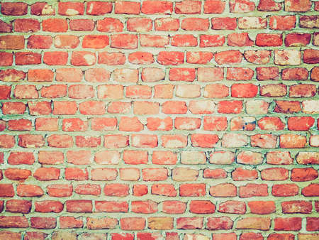 Vintage retro looking Red brick wall useful as a background