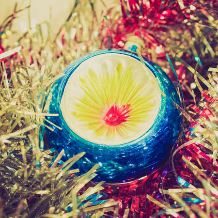 Vintage looking Tinsel and baubles for Christmas tree decorationの写真素材