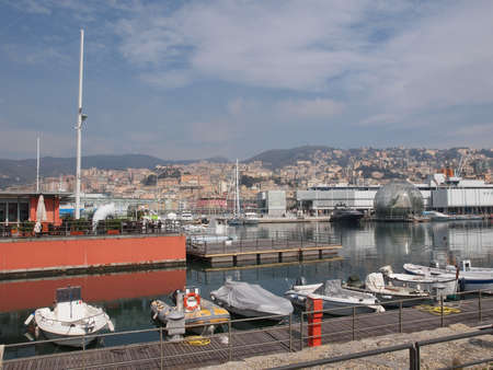 GENOA, ITALY - MARCH 16, 2014: Since the construction of the new harbour for merchant ships, the old harbour called Porto Vecchio is still in use for cruise ships and small boatsのeditorial素材