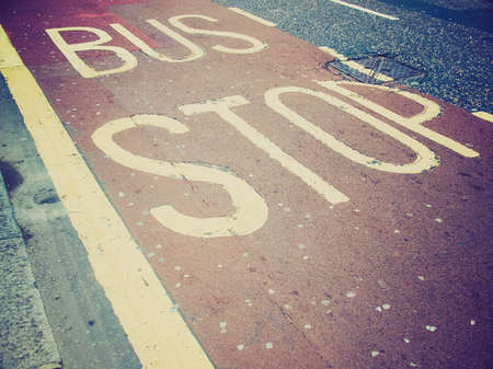 Vintage looking Sign of a bus stop in a road or street