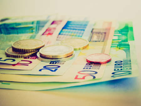 Vintage looking Euro banknotes and coins picture