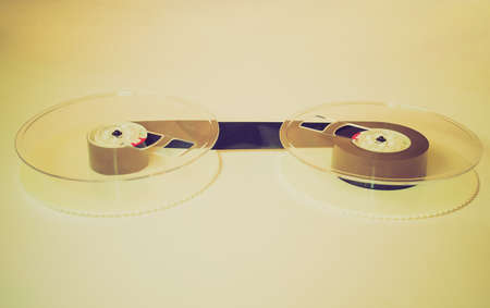 Vintage looking Magnetic tape reel for computer data and audio video storageの写真素材