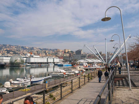 GENOA, ITALY - MARCH 16, 2014: Since the construction of the new harbour for merchant ships, the old harbour called Porto Vecchio is still in use for cruise ships and small boatsのeditorial素材