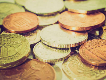 Vintage looking Range of British Pounds coins (UK currency)の写真素材