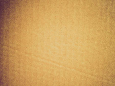 Vintage looking Corrugated cardboard box useful as a backgroundの写真素材