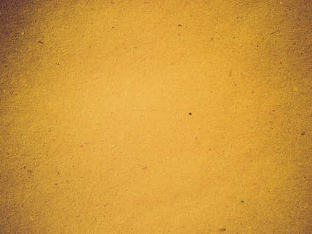 Vintage looking Blank sheet of brown paper useful as a backgroundの写真素材