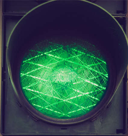 Vintage looking Green light on a traffic light or semaphoreの写真素材