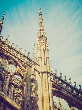 Vintage looking Duomo di Milano gothic cathedral church, Milan, Italyの写真素材