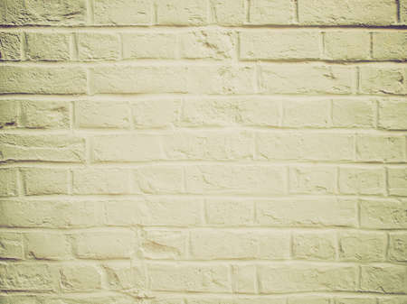 Vintage looking White brick wall useful as a backgroundの写真素材