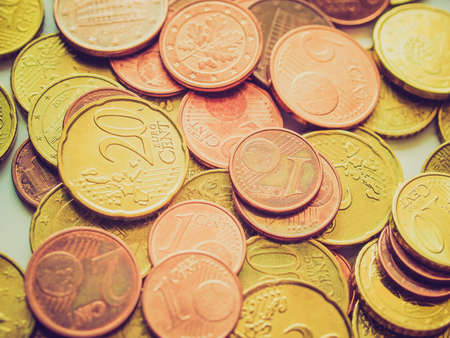 Vintage looking Euro coins money (European currency) useful as a background