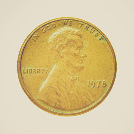 Vintage looking One Cent coin isolated over a white background