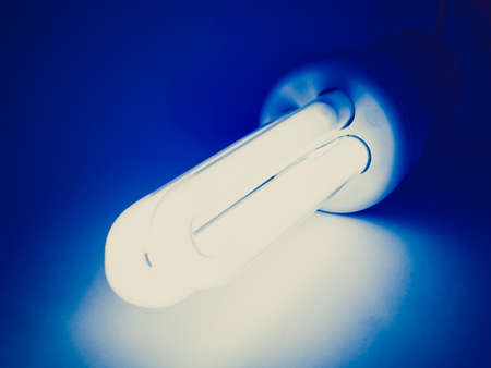 Vintage looking Compact fluorescent light bulb ecological low carbonの写真素材