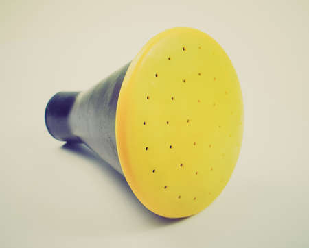 Vintage looking Perforated pouring piece on a watering can pot