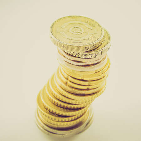 Vintage looking A pile of Euro and Pounds coinsの写真素材