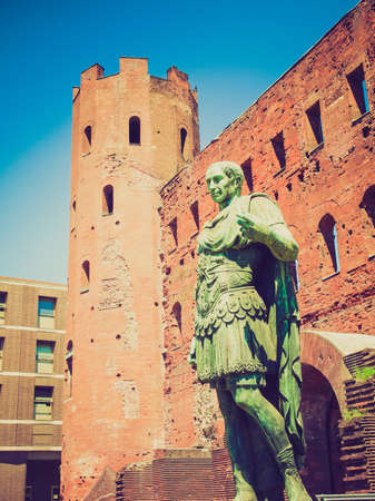 Vintage looking Palatine towers (Porte Palatine) ancient roman town gates Turinのeditorial素材