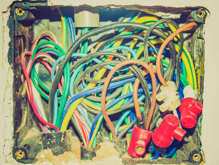 Vintage looking Junction box container with electrical wires connectionsの写真素材