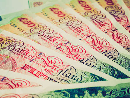Vintage looking Detail of British Pounds banknotes money