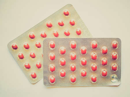 Vintage looking Pharmaceutical over the counter or prescription pillsの写真素材