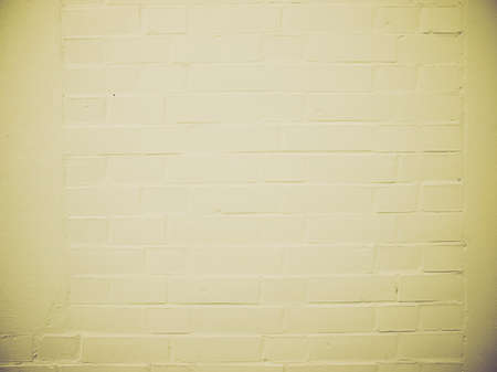 Vintage looking White brick wall useful as a backgroundの写真素材
