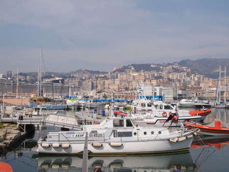 GENOA, ITALY - MARCH 16, 2014: Since the construction of the new harbour for merchant ships, the old harbour called Porto Vecchio is still in use for cruise ships and small boatsのeditorial素材