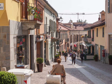 RIVOLI, ITALY - APRIL 09, 2014: People visiting the old town city centreのeditorial素材