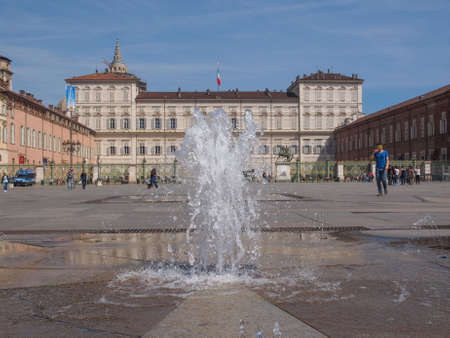 TURIN, ITALY - APRIL 09, 2014: Tourists visiting Piazza Castello, the central baroque squareのeditorial素材