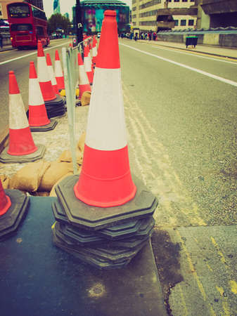 Vintage looking Traffic cone used in street road worksのeditorial素材