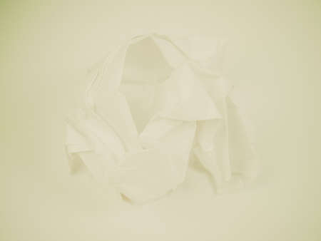 Vintage looking White wrapped crumpled paper ball - close detailの写真素材