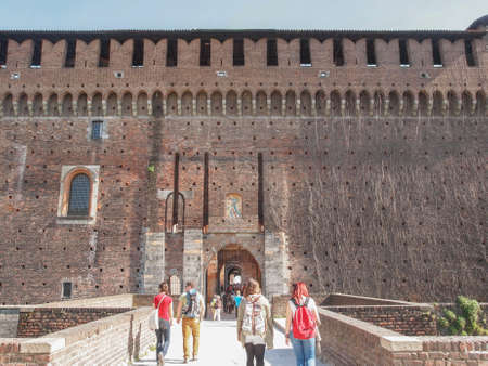 MILAN, ITALY - APRIL 10, 2014: People visiting the Sforza Castle aka Castello Sforzesco which is the oldest castle in townのeditorial素材