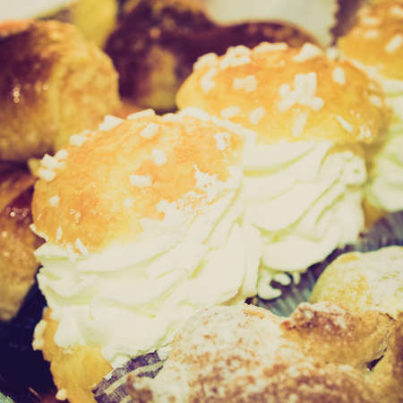 Vintage looking Mixed pastries with chocolate,の写真素材