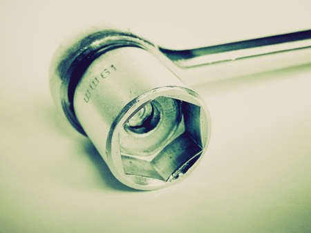 Vintage looking Detail macro of a wrench spanner toolの写真素材