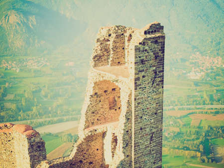 Vintage looking Ruins of Torre di Bell Alda (Tower of the Beautiful Alda) at Sacra di San Michele in Italyの写真素材