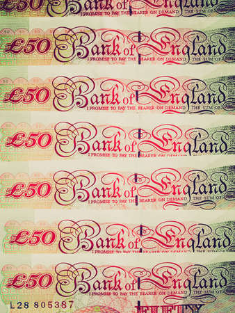 Vintage looking Detail of British Pounds banknotes money
