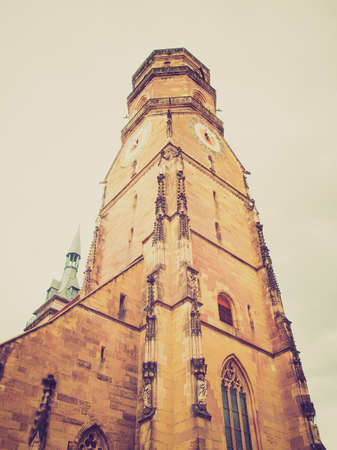 Vintage looking Stiftskirche Church in Schillerplatz, Stuttgart, Germanyの写真素材