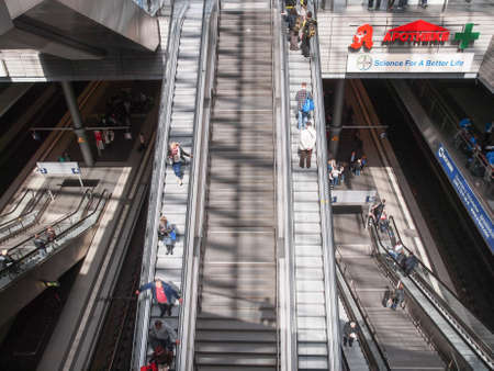 BERLIN, GERMANY - MAY 10, 2014: Travellers in the new Berlin Hauptbahnhof central station